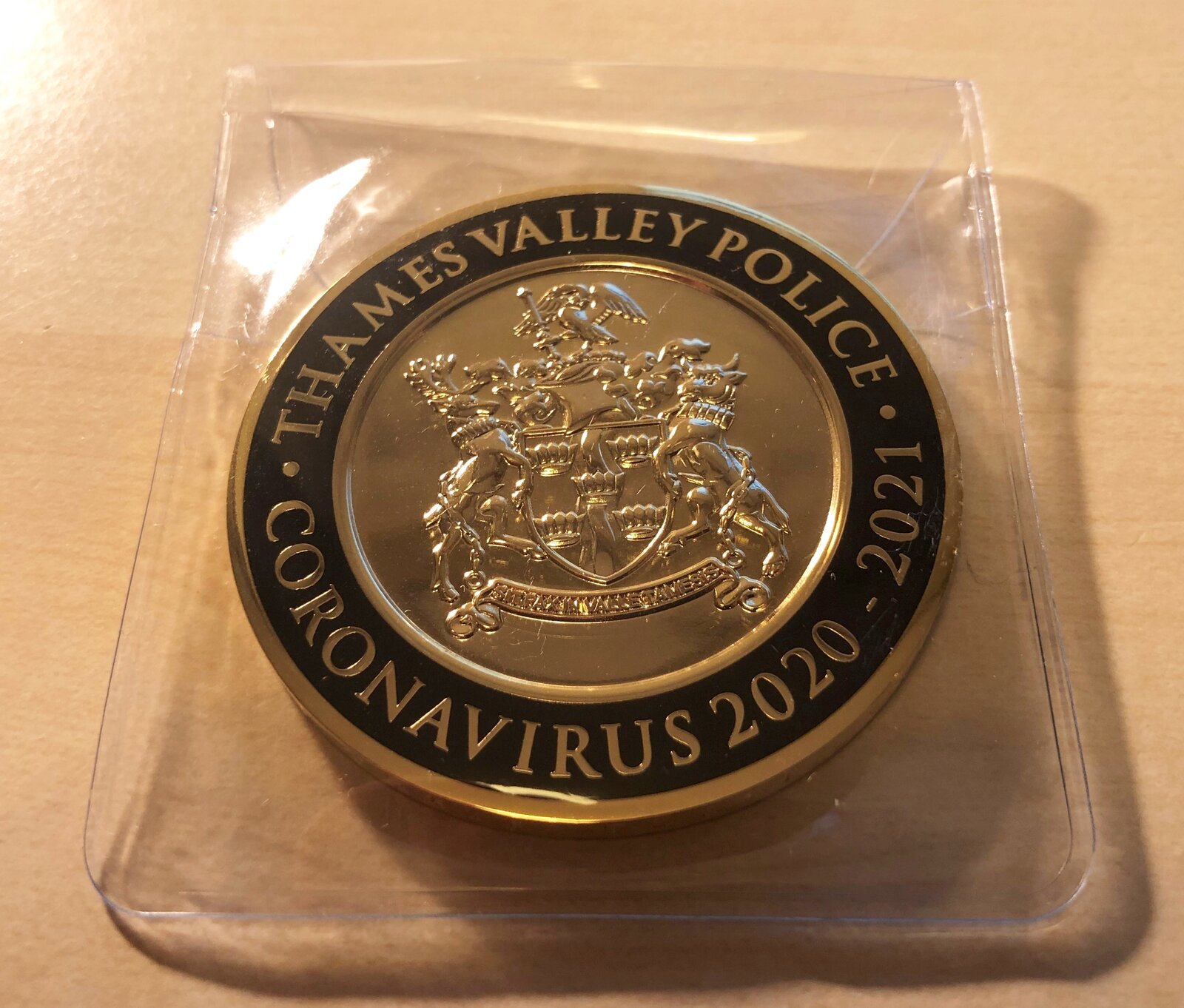 Commemorative coins were sent to Thames Valley Police staff and volunteers. Images via online forum user.