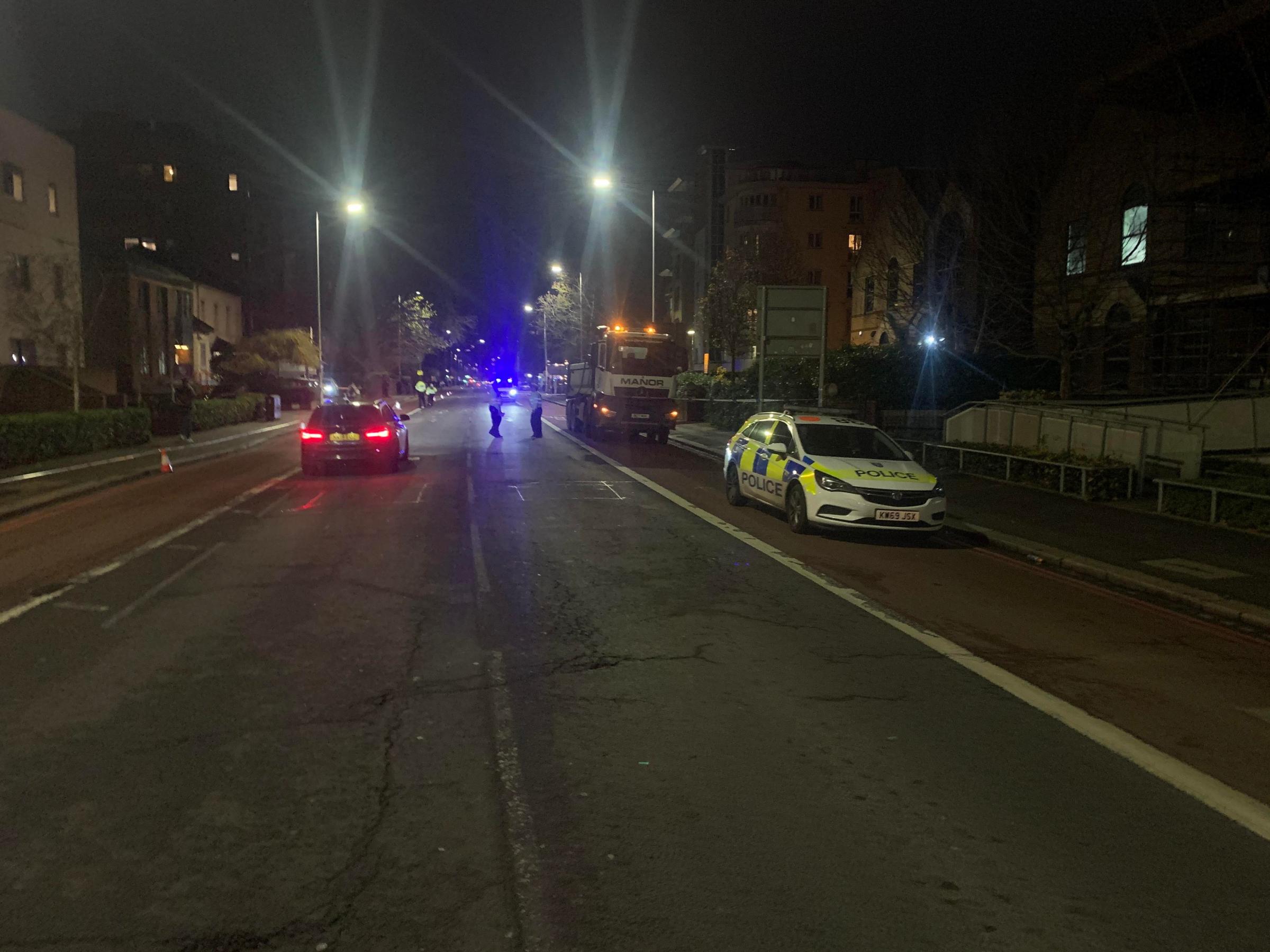 Police cordon off Kings Road, Reading, following the incident. 